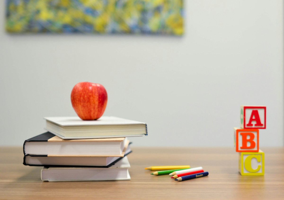 Student desk with books and calculator for school planning